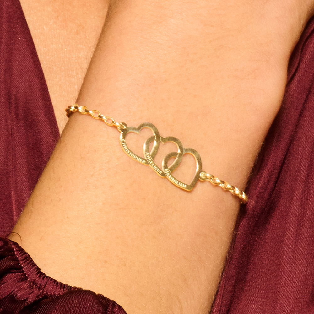 Gouden armband met drie hartjes