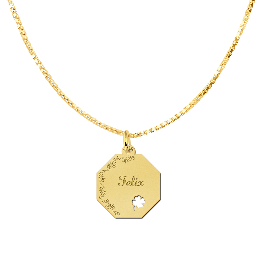 Dit is een elegante gouden graveerplaat voor je naam met een geluks klavertje vier.